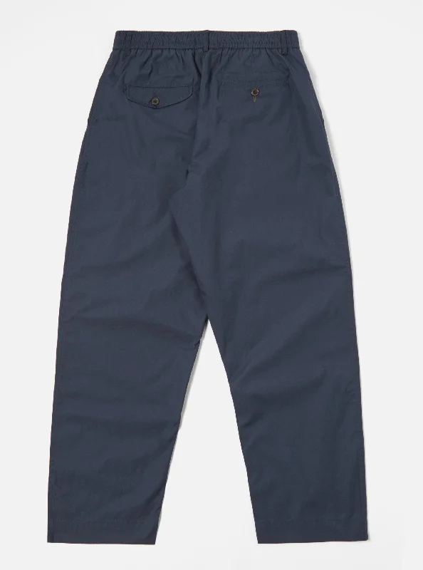 universal-works-oxford-pant-in-navy-recycled-poly-tech