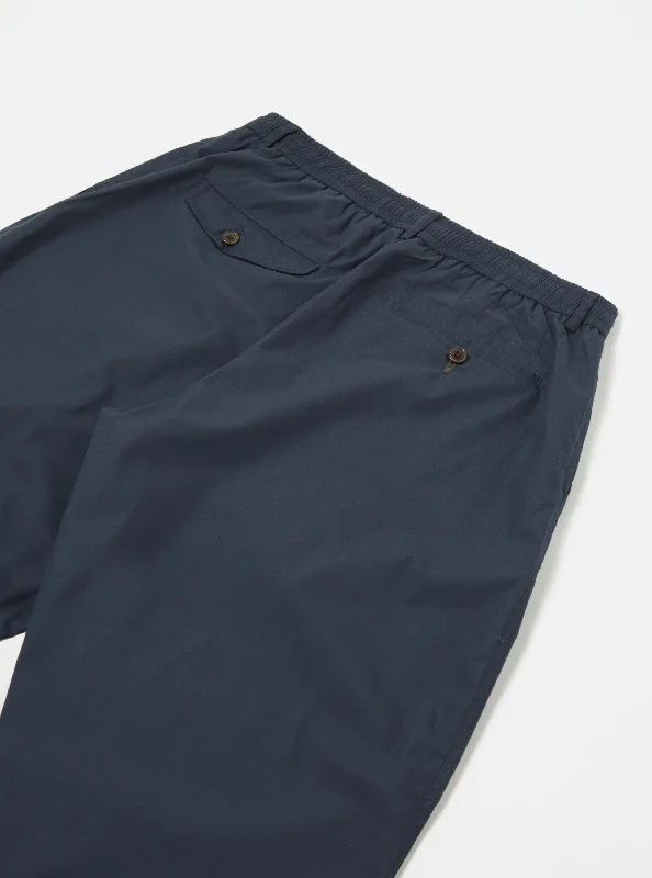 universal-works-oxford-pant-in-navy-recycled-poly-tech