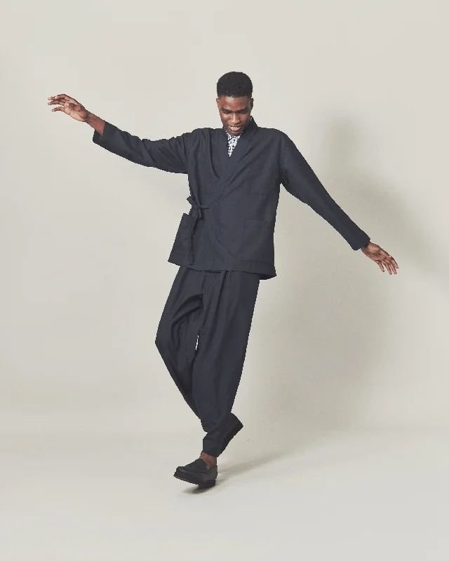 universal-works-pleated-track-pant-in-navy-tropical-suiting