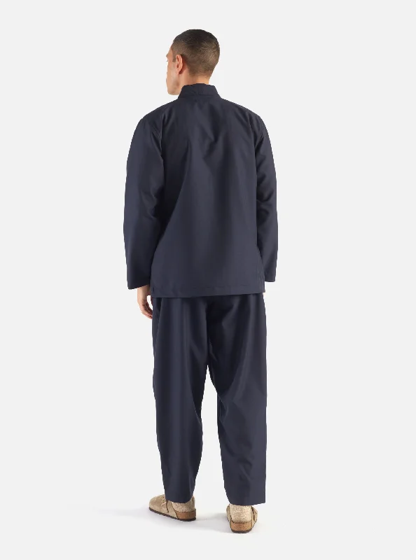 universal-works-pleated-track-pant-in-navy-tropical-suiting