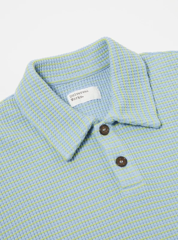 universal-works-s-s-newlyn-polo-in-sky-fluro-stripe