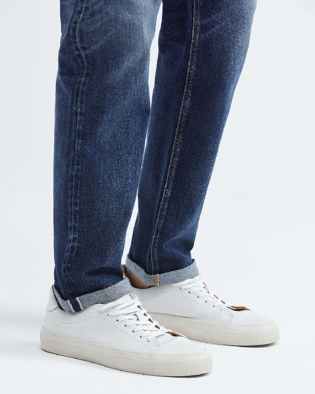 STRAIGHT FIT MID-RISE JEANS IN DARK WASH