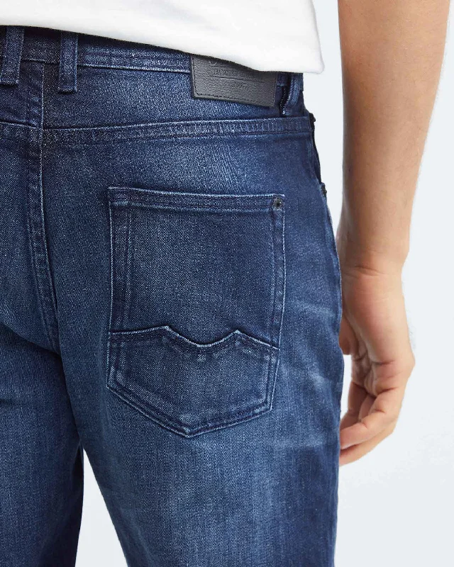 STRAIGHT FIT MID-RISE JEANS IN DARK WASH