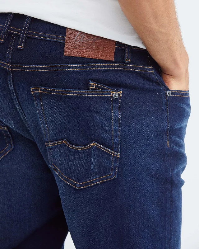 STRAIGHT FIT MID-RISE JEANS IN DARK WASH